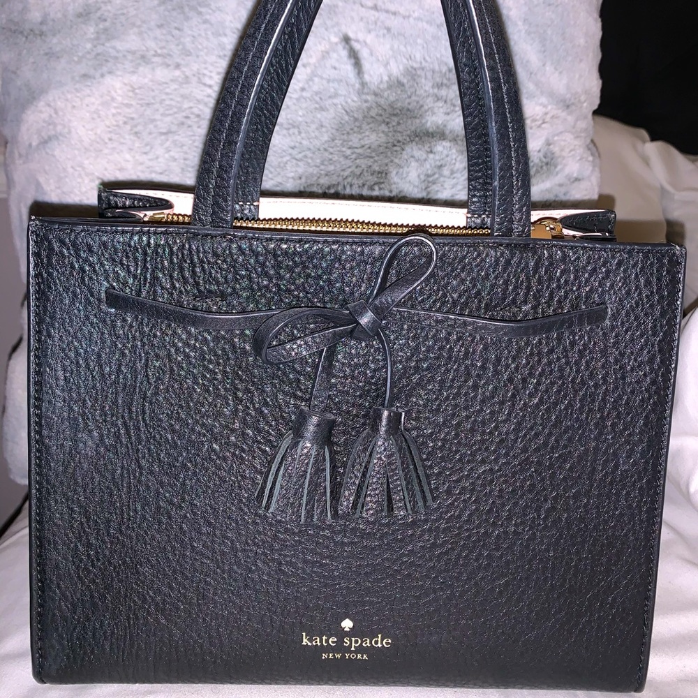 Women’s Kate Spade purse & comes with small wallet!